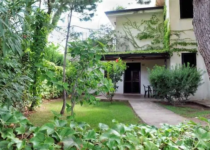 Lägenhetshotell Villaggio Pineta Petto Bianco