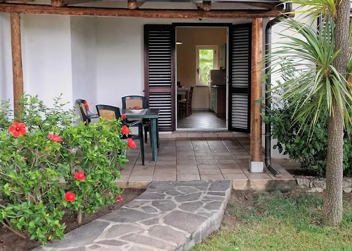 Lägenhetshotell Villaggio Pineta Petto Bianco