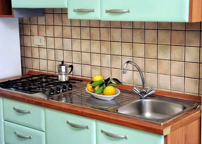 Lägenhetshotell Villaggio Pineta Petto Bianco 4*