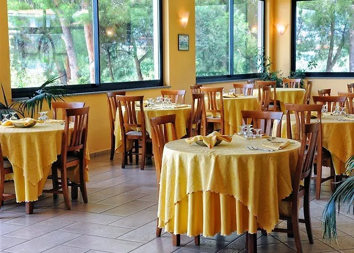 Lägenhetshotell Villaggio Pineta Petto Bianco